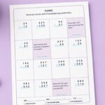 Fitxa de sumes de 2 i 3 xifres combinades amb preguntes de valor posicional, per a 3r de Primària en català.